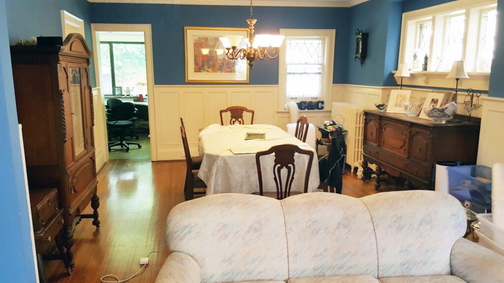 In this before photo, the home, was hindered by dim lighting and oppressively dark walls.